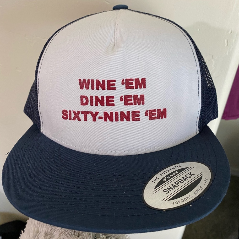 Wine em, dine em, sixty nine em hat